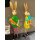ganz großer frühlingshafter XXL Osterhase aus Metall bunt bemalt mit großer Möhre als Hasenjunge in grün-pink oder Hasenmädchen in hellgelben Kleid
